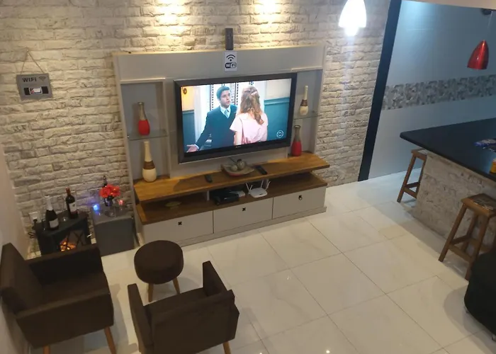 Casa Moderna E Aconchegante A Beira Mar, Com Opcao De Piscina Aquecida Cobrado A Parte, Area Gourmet Com Churrasqueira Em Deck Coberto Frente A Piscina, Aconchegante Sala De Estar Com Lareira, Garagem Para 4 Carros, Casa Pe Na Areia A 50 Metros Da Pr